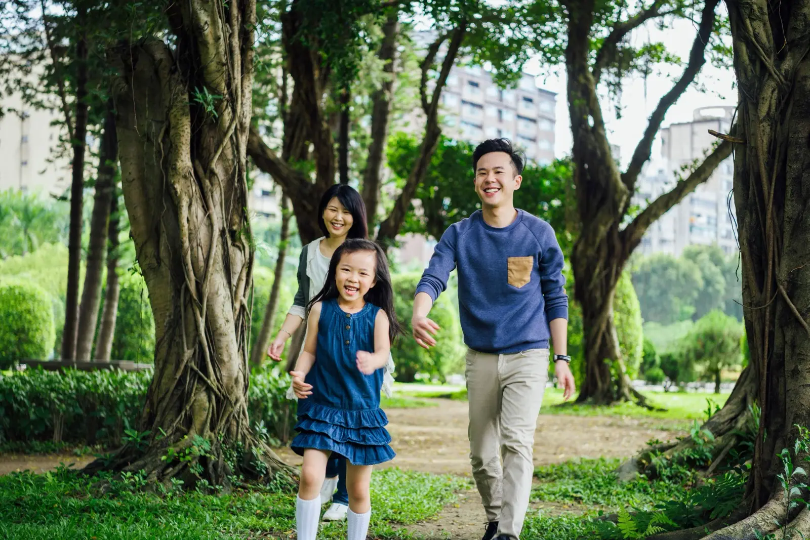 family walking in a park